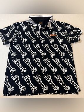 Le Tigre Black Polo with White Tiger Print and Orange Logo